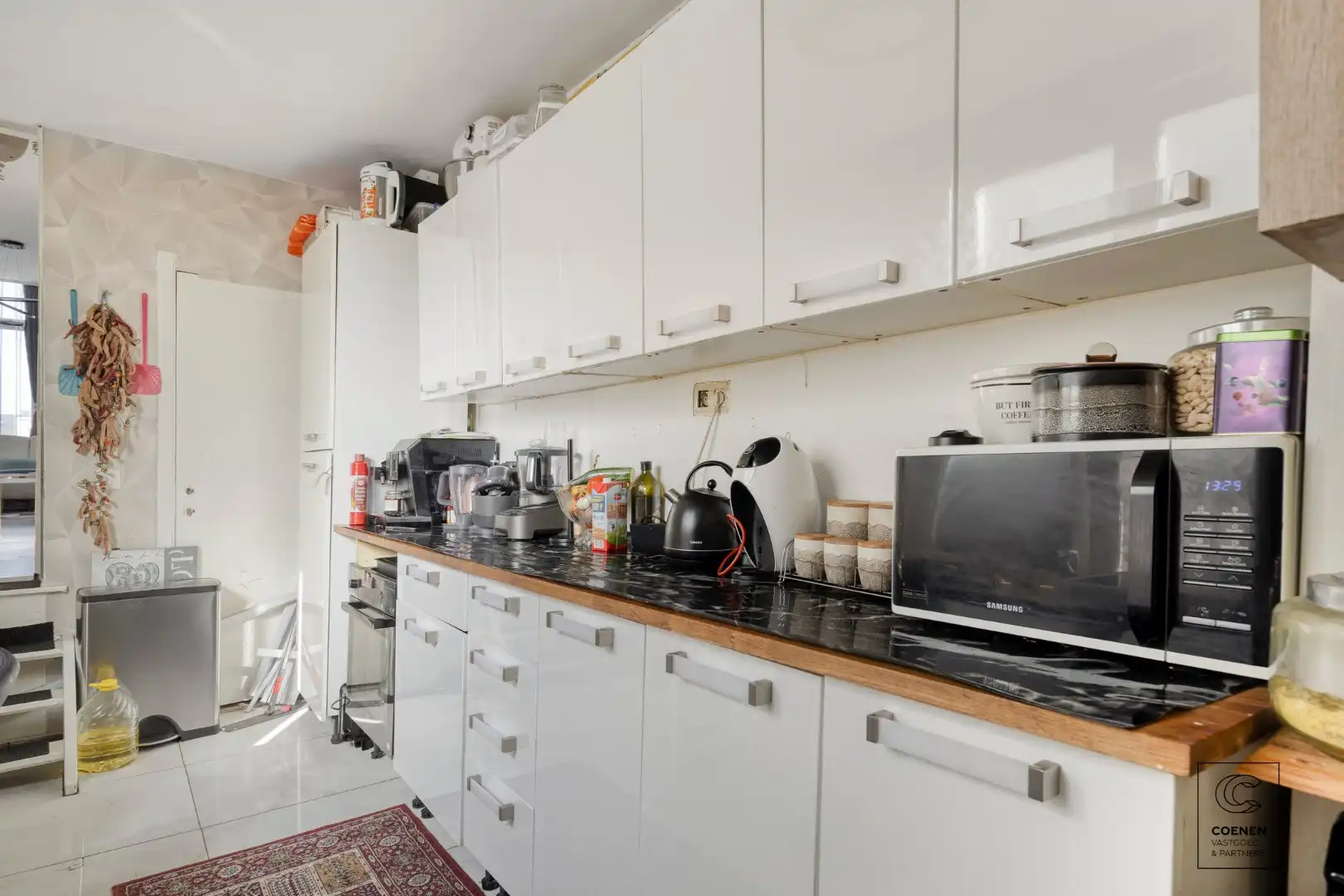 Ruime handelswoning, momenteel ingericht als handelsruimte en 2 appartementen op goede ligging te Antwerpen! foto 17