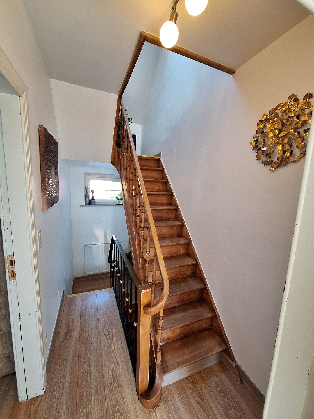 Gerenoveerde instapklare woning met terras en tuin foto 9