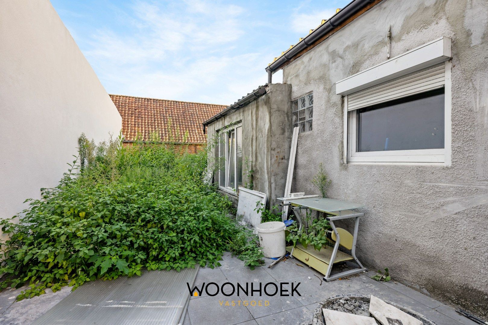 Te renoveren woning in centrum Overmere foto 17