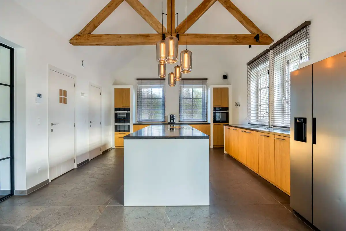 Ruim ingedeelde en kwalitatief afgewerkte villa op een mooi perceel met naastgelegen bouwgrond. foto 7