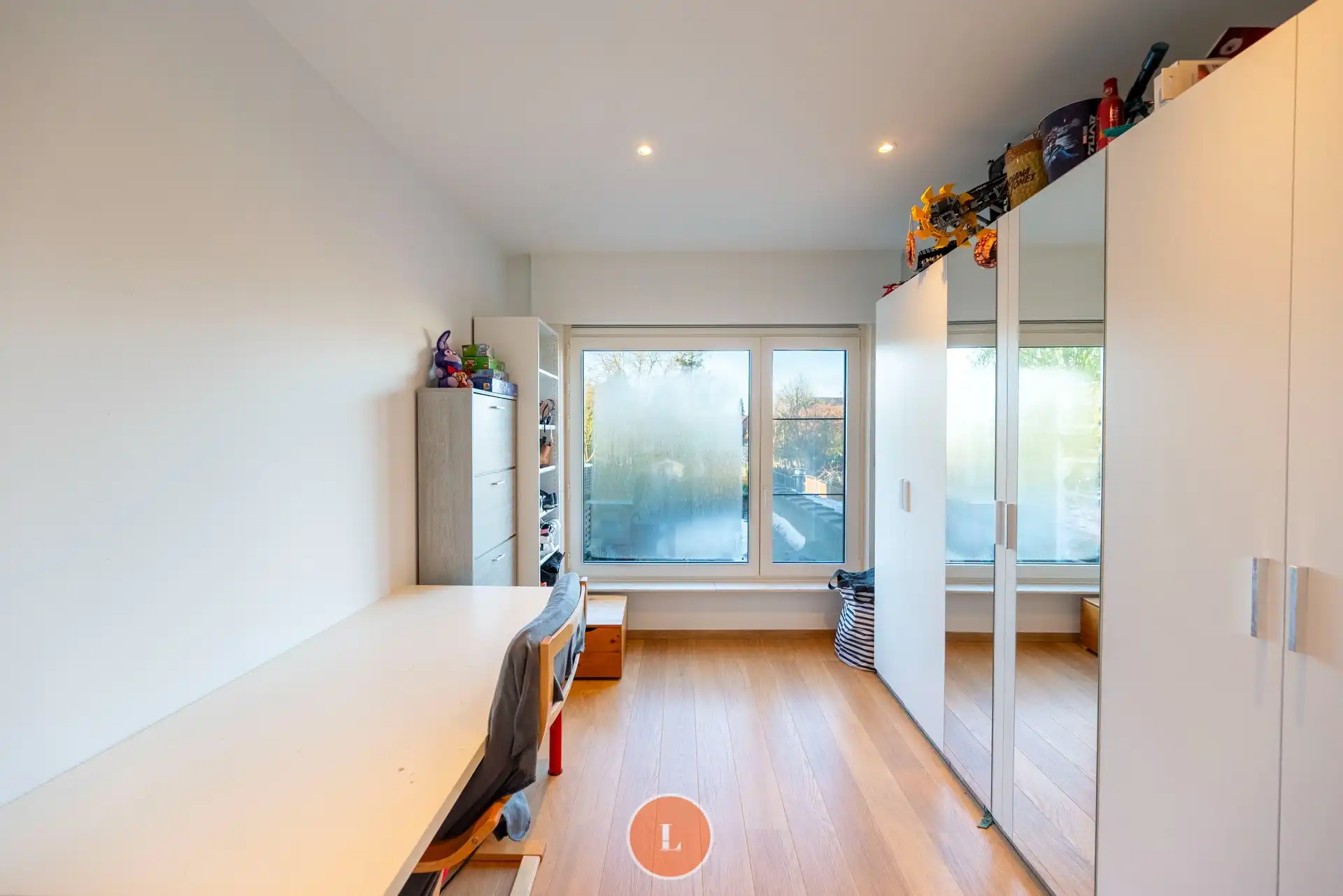 Instapklare gezinswoning met garage en tuin in Wevelgem. foto 13