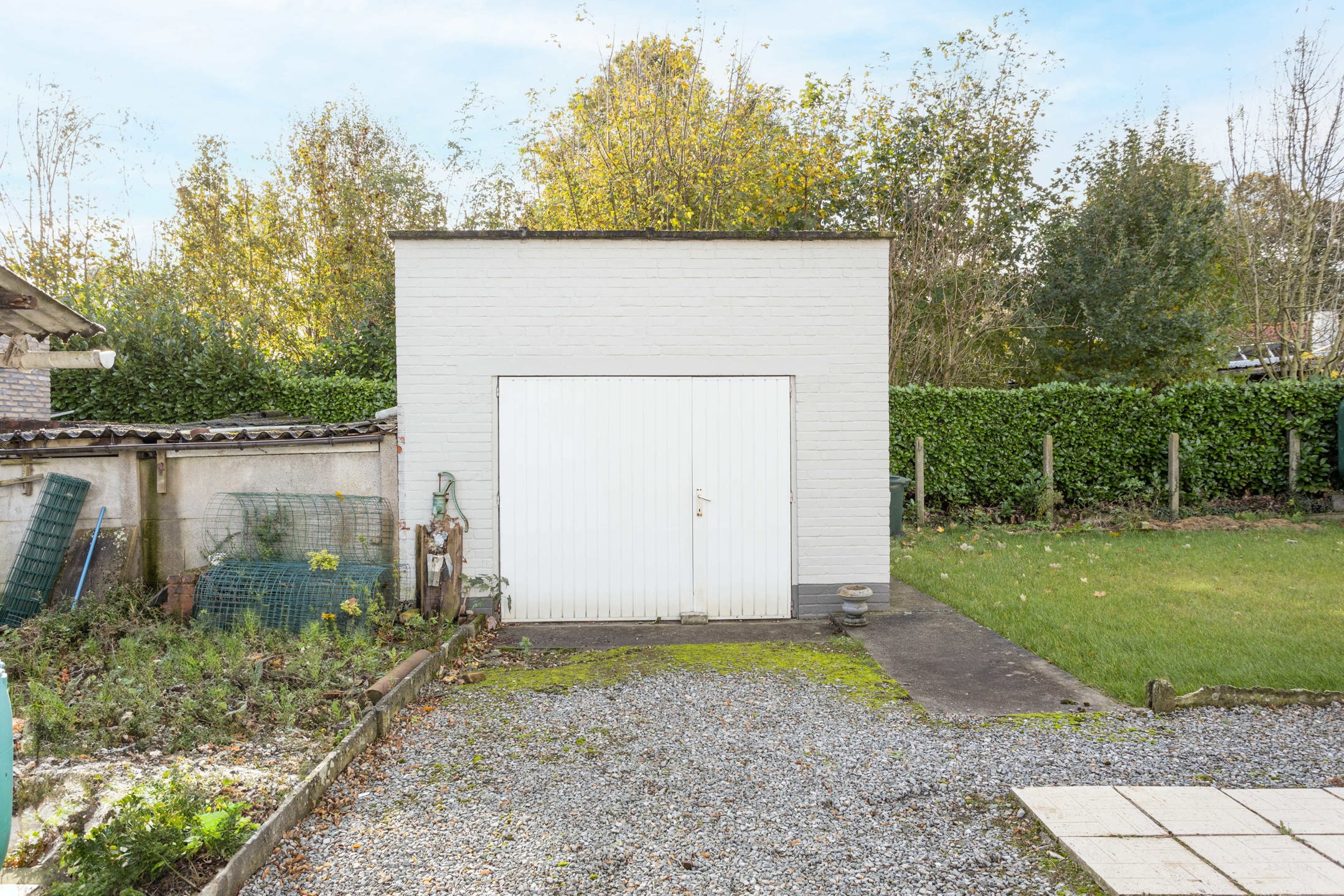 Te renoveren koppelvilla met tuin en garage in het groen! foto 19