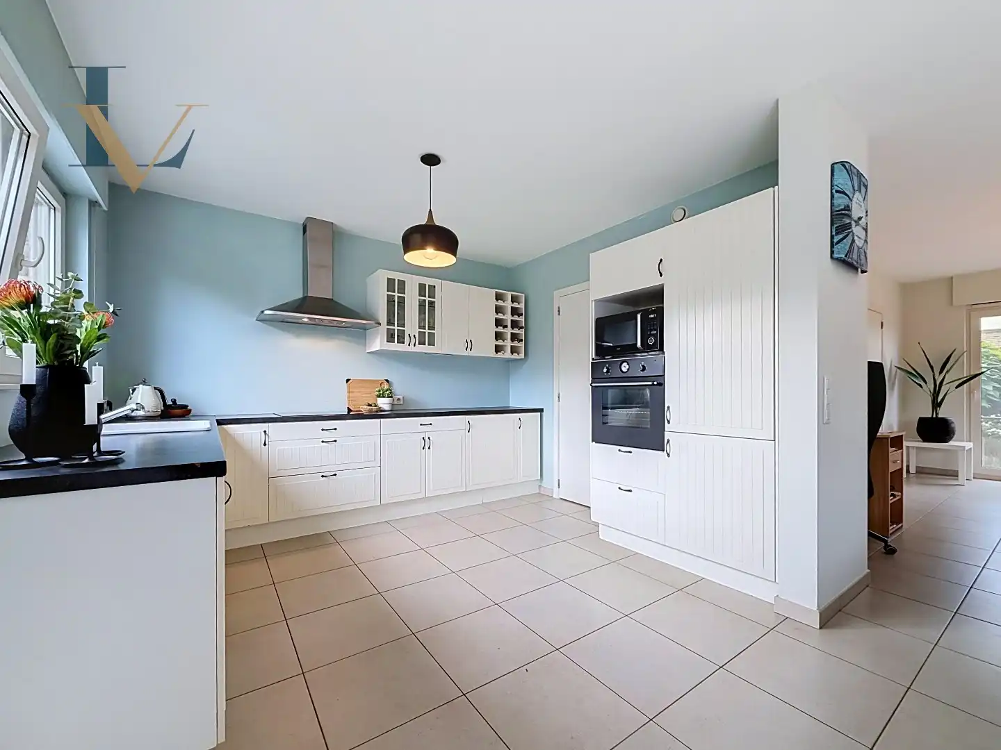Instapklare halfopen bebouwing met 3 slaapkamers, afgewerkte zolder, zwembad en EPC A foto 6