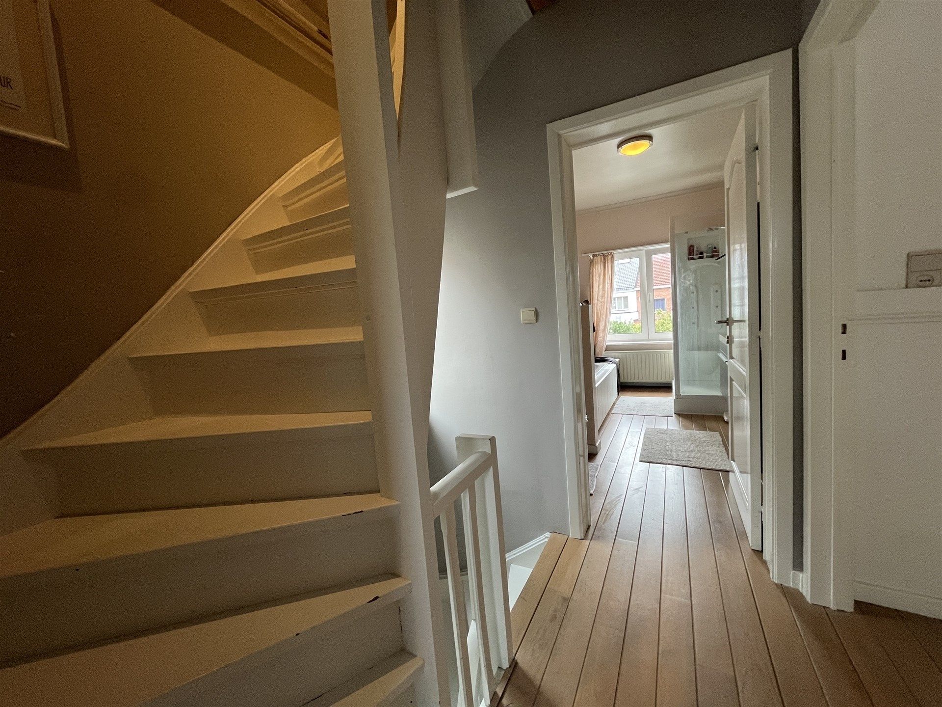 Halfopen bebouwing met garage en tuin foto 12