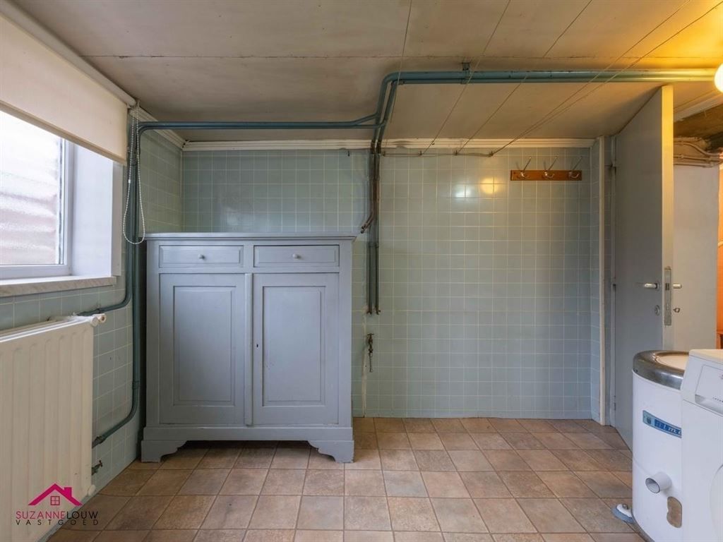 Vrijstaande splitlevel woning, te renoveren naar eigen smaak foto 26