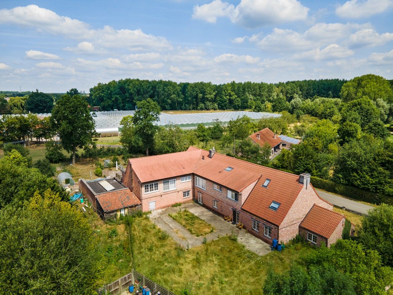 Polyvalent gebouw, appartement en magazijn te koop in Emblem! foto 40