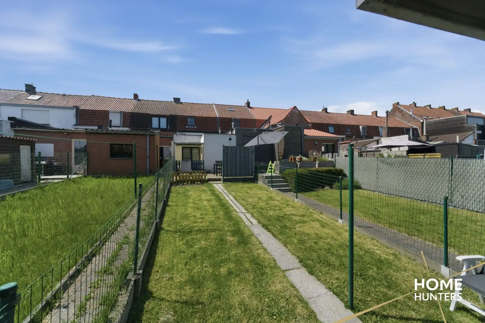 Instapklare woning met prachtige tuin op rustige ligging in Ieper foto 22