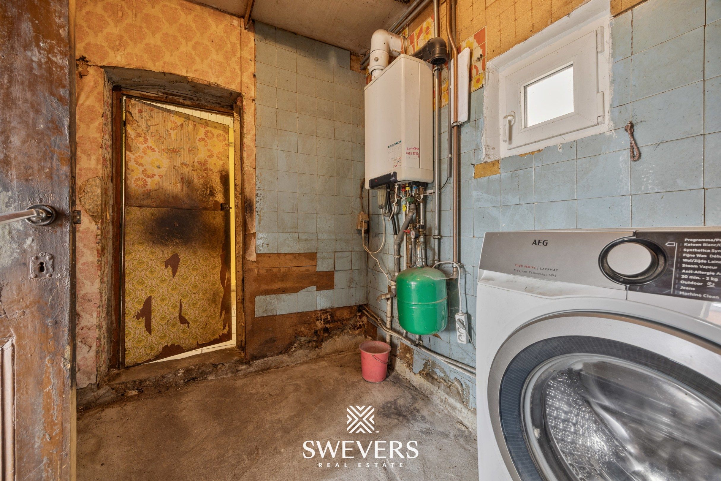 Te renoveren open bebouwing met groot perceel in rustige straat in Bilzen foto 14
