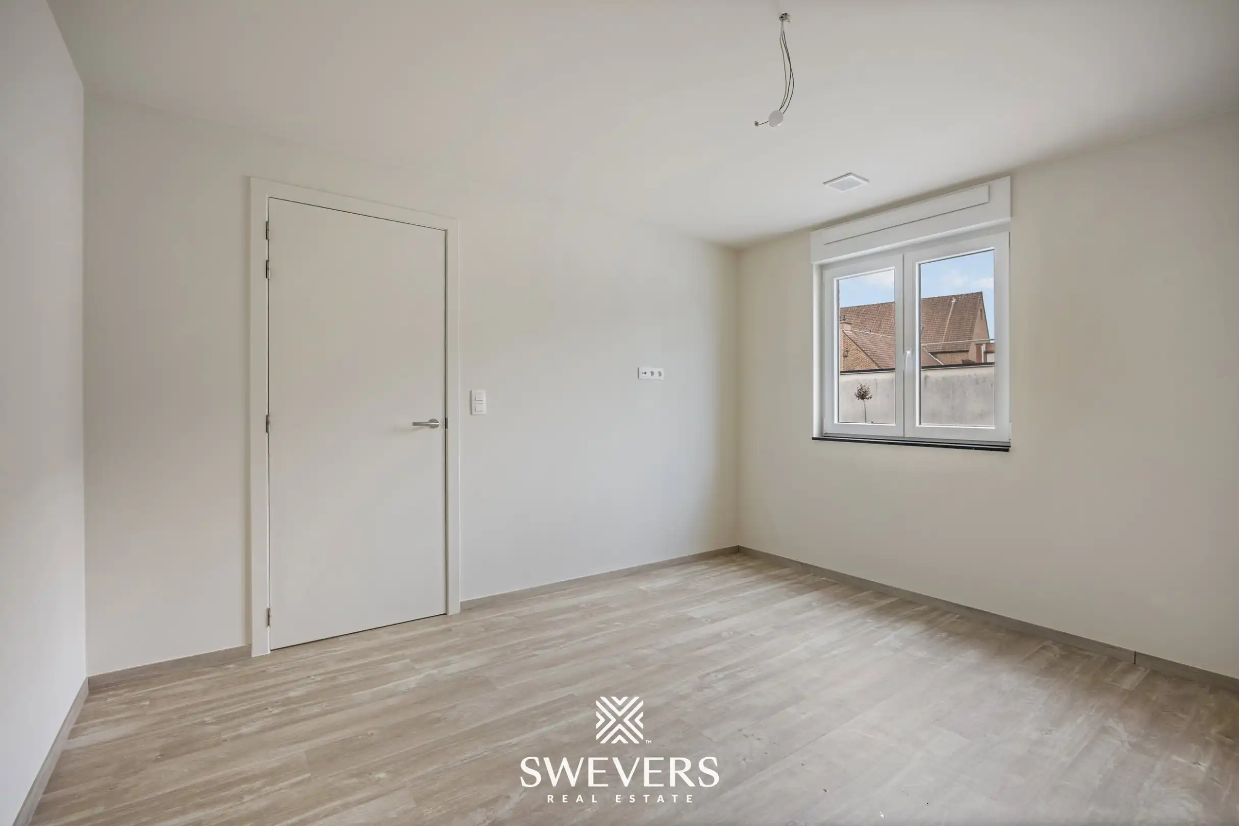 Modern gelijkvloers appartement met privétuin en dubbele parking foto 8