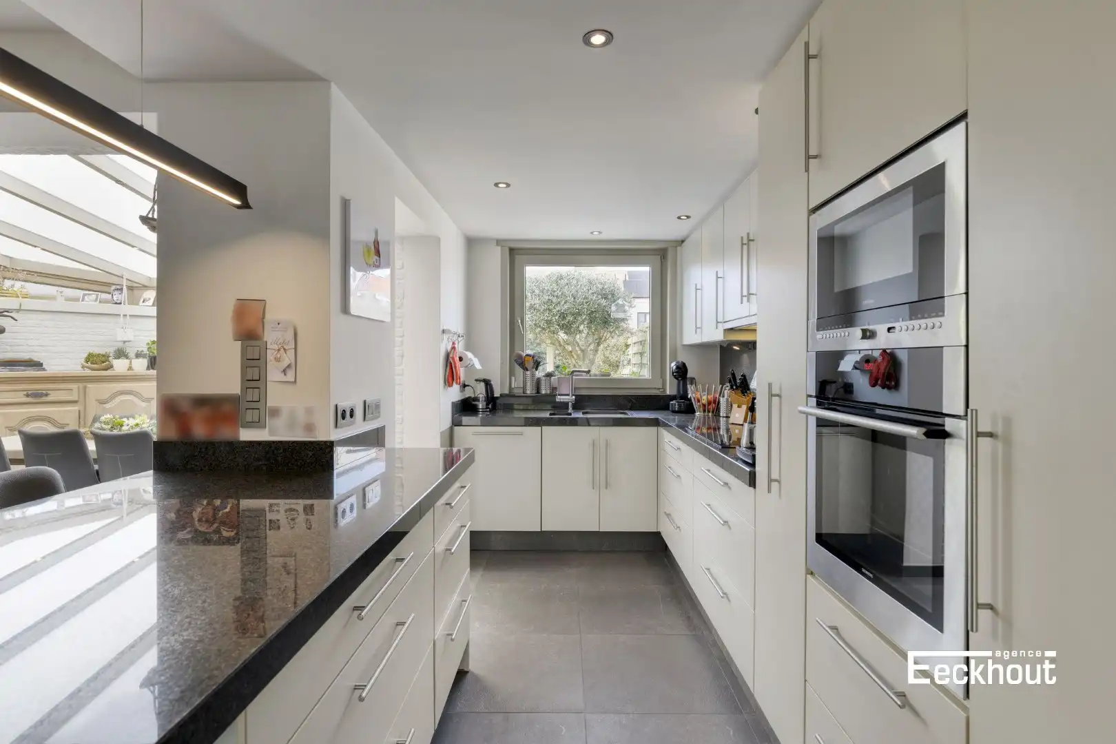 Instapklare woning met handelsruimte en met zonnige tuin! foto 8