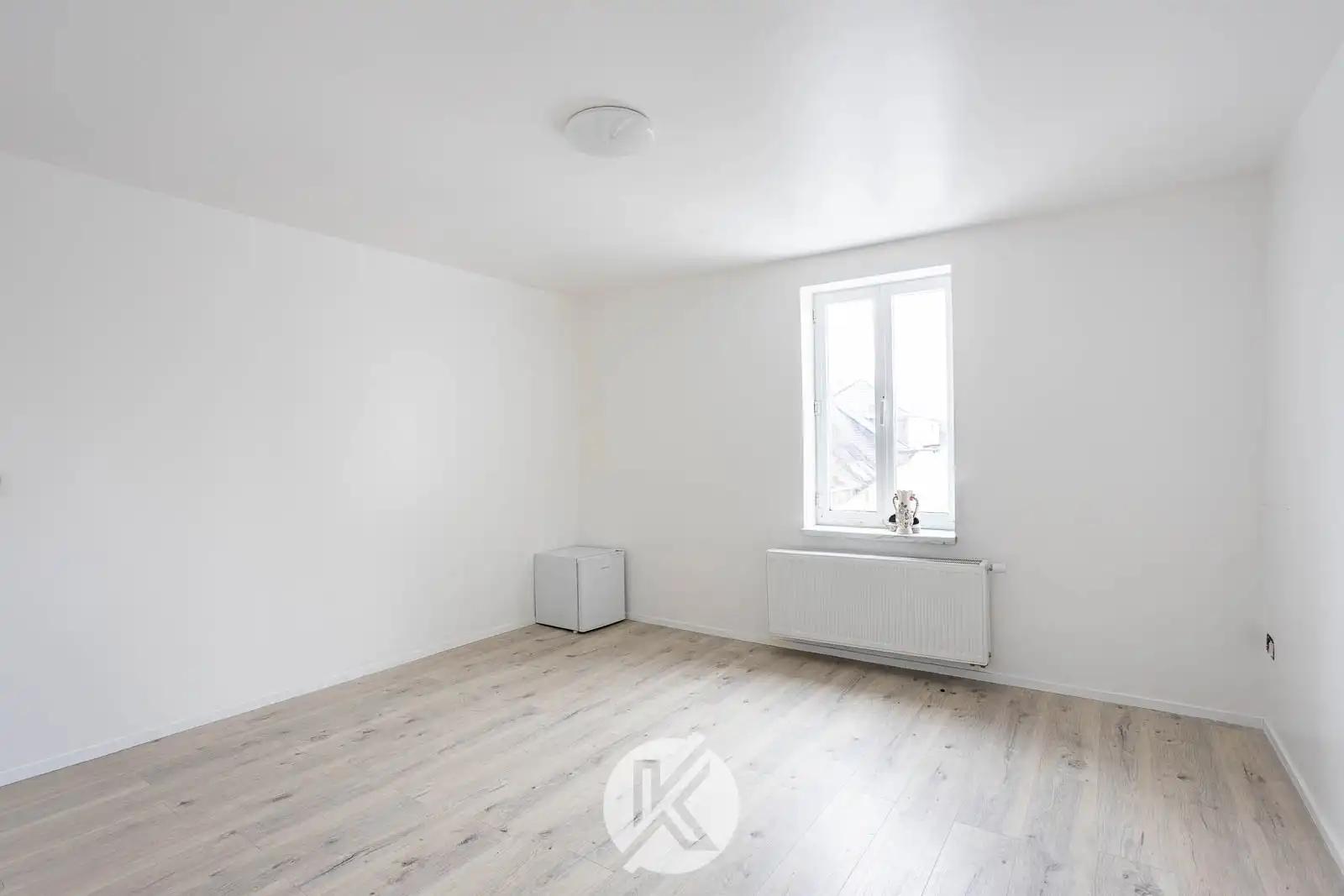 Veelzijdige woning op het dorpsplein foto 21