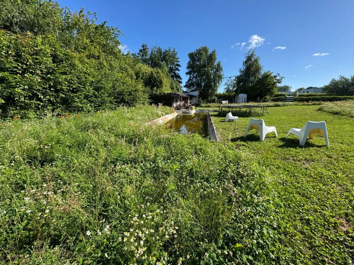 TE KOOP: Ruime architectenwoning in residentiële wijk 'De Piste'. Rustig, groen en zeer bereikbaar perceel van 1800m²!  foto 22