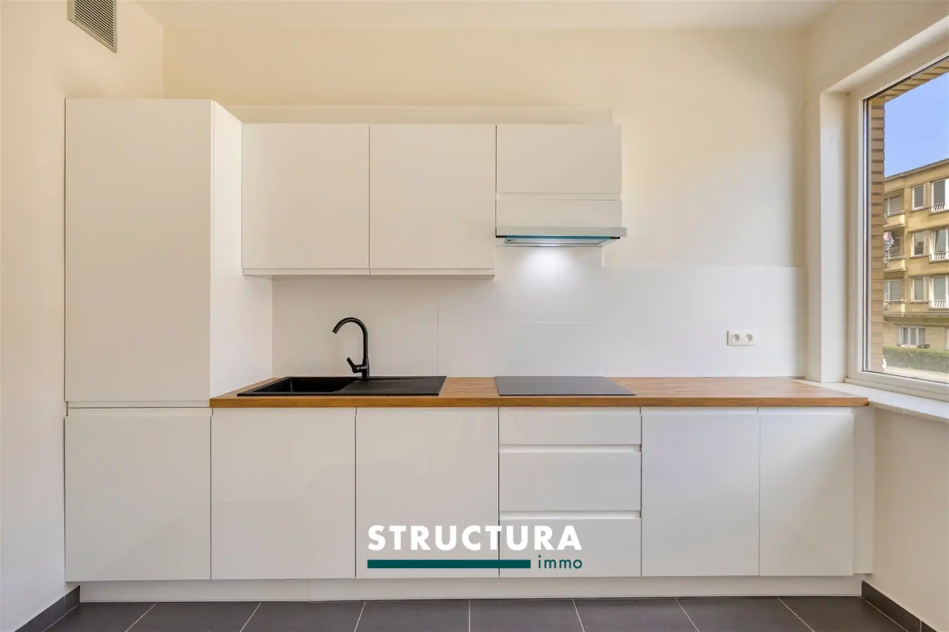 Gerenoveerd appartement met tuin op centrale ligging foto 6