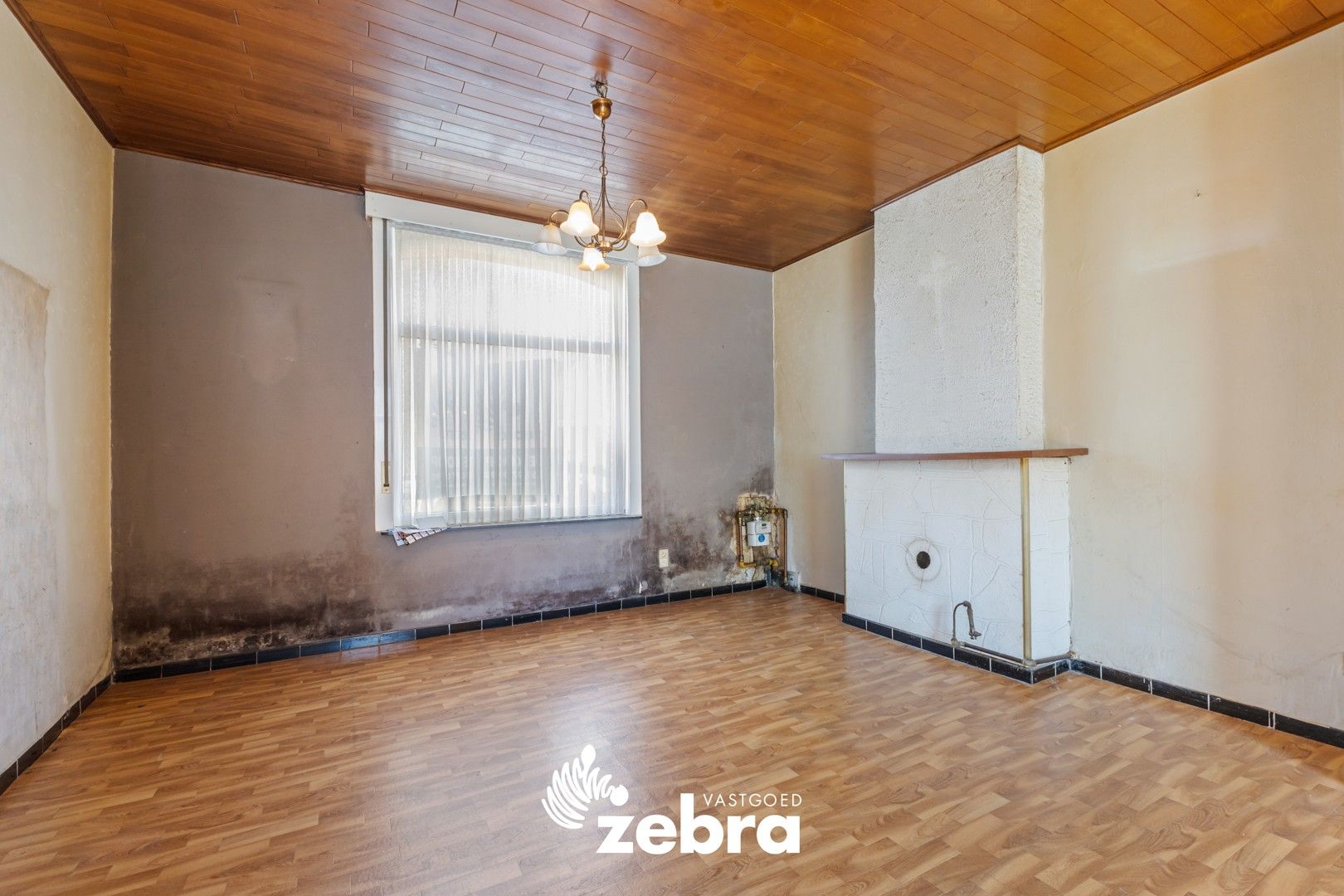 Te renoveren woning met stadskoer in centrum Tielt! foto 4