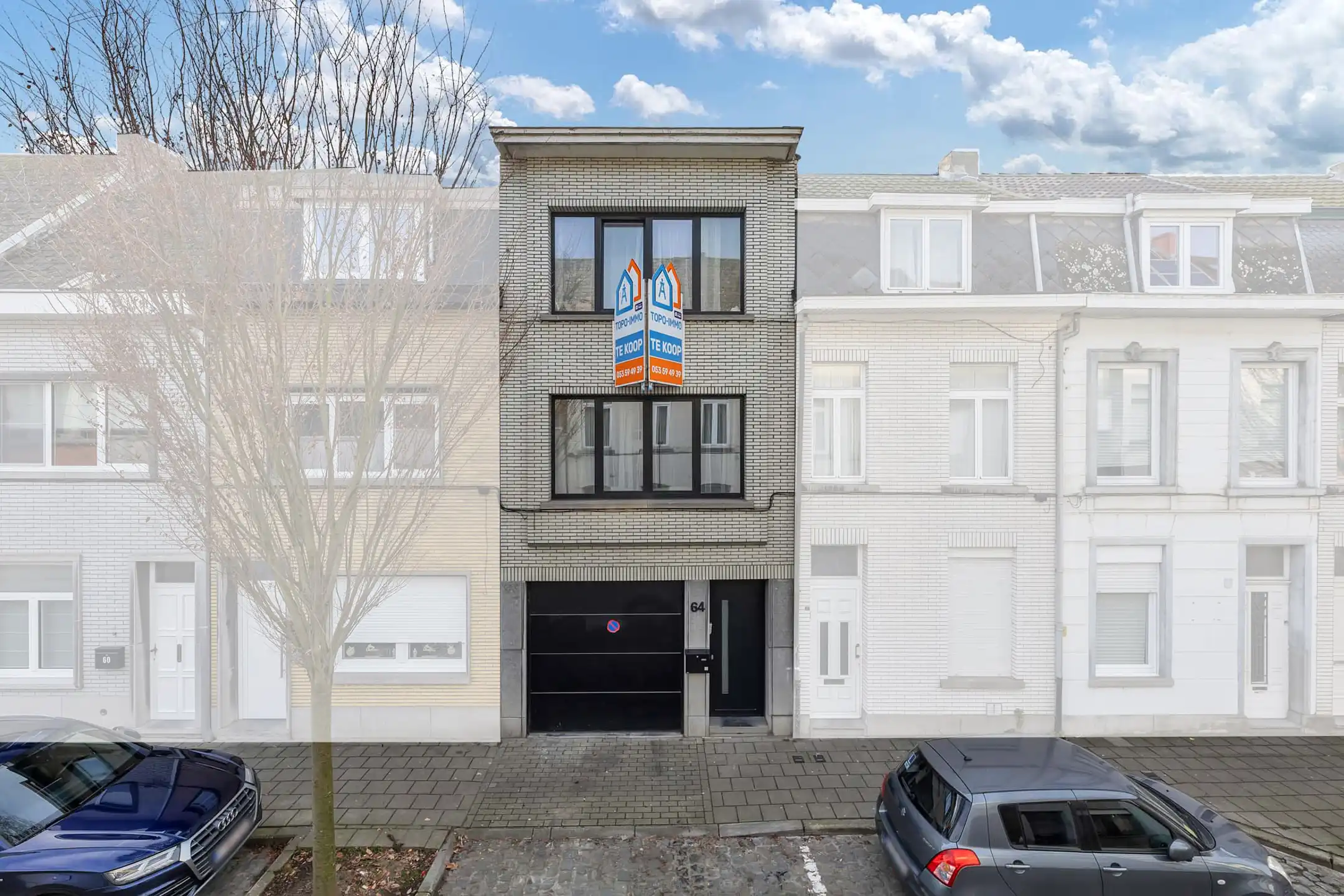 Hoofdfoto van de publicatie: Instapklare woning met 2 slpks en garage te centrum Aalst