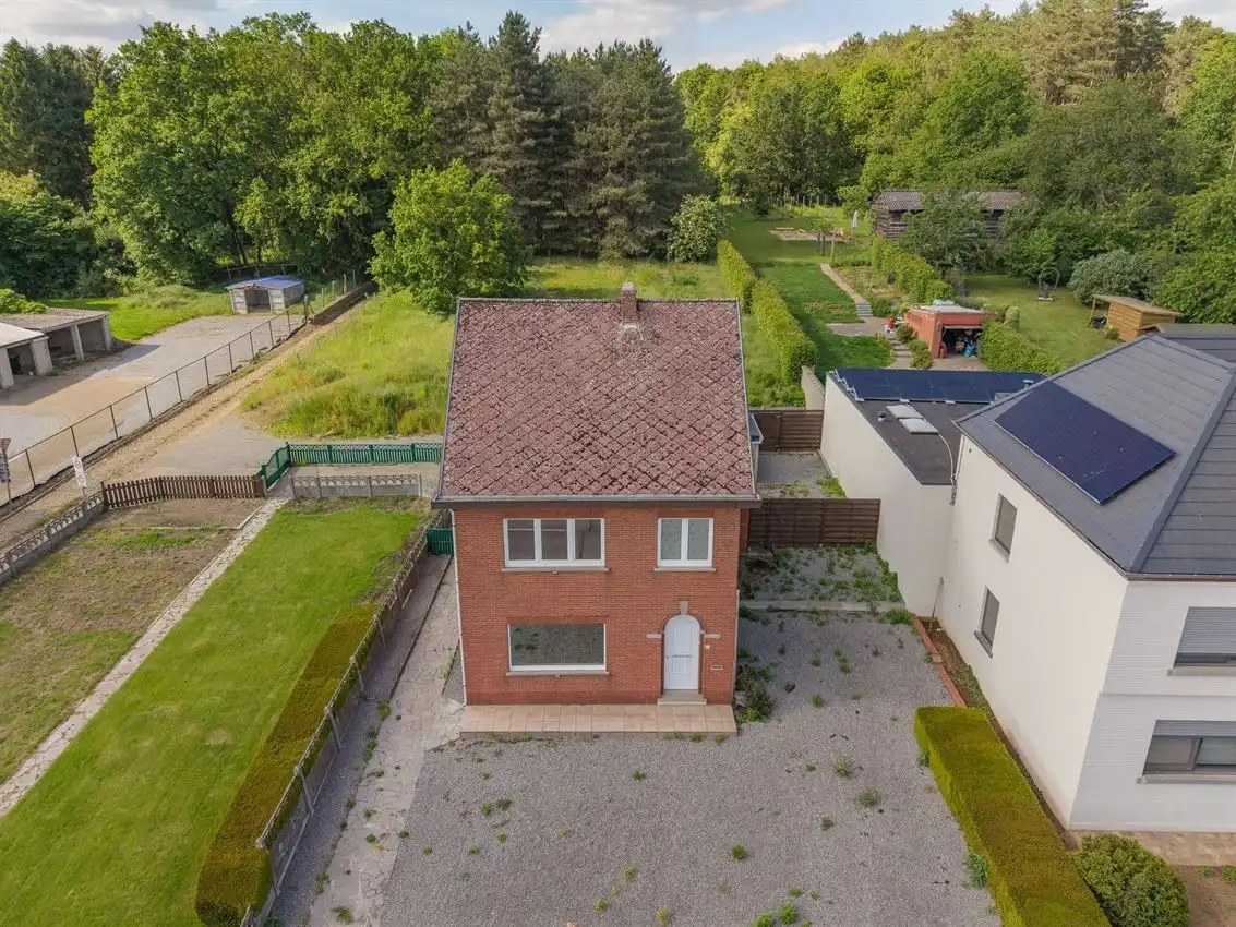 Karaktervolle woning met grote tuin, bijgebouwen en uitbreidbaar zoldervolume op een verrassend diep perceel foto 5