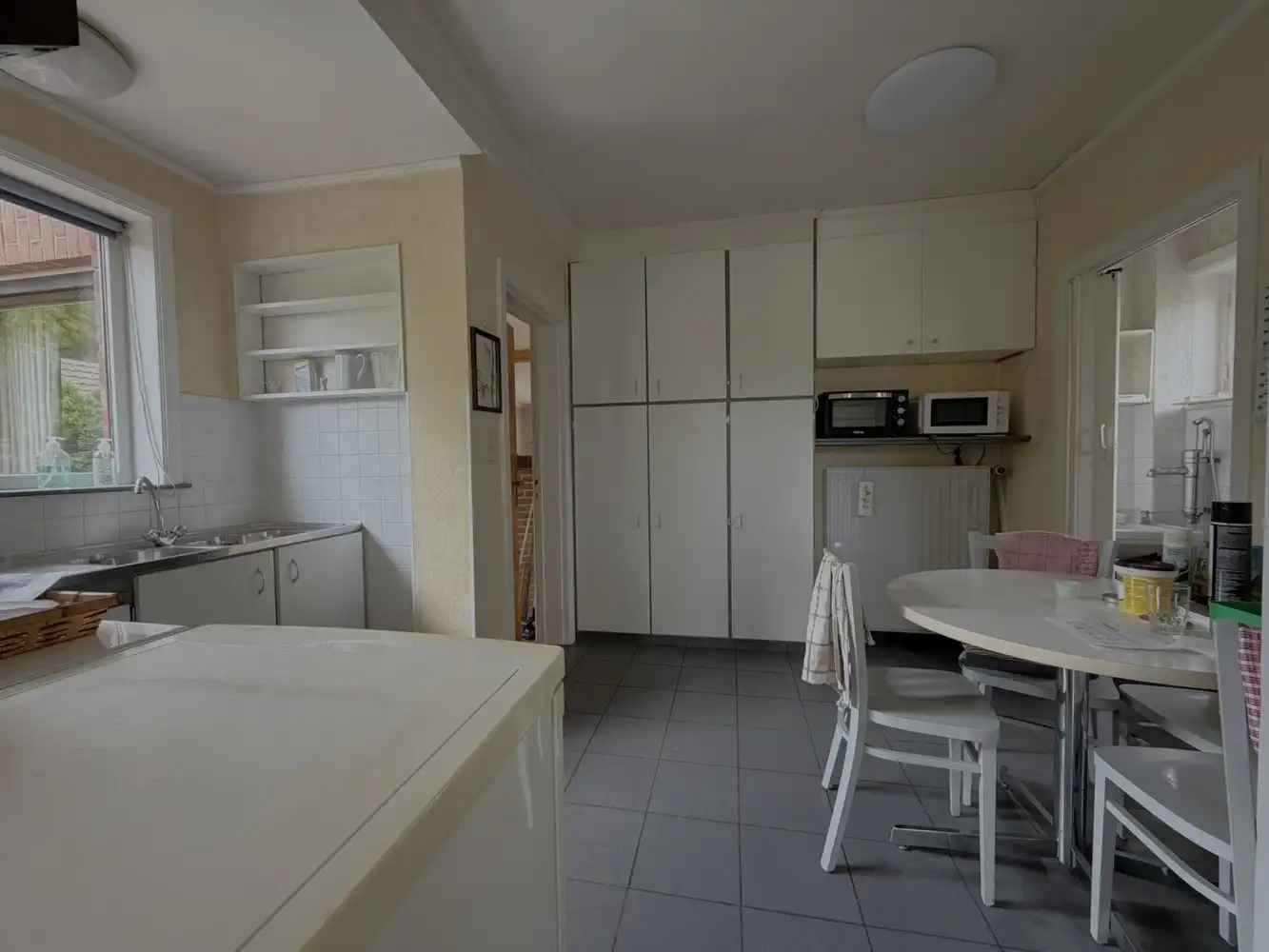 Op te frissen alleenstaande woning met riante tuin foto 8