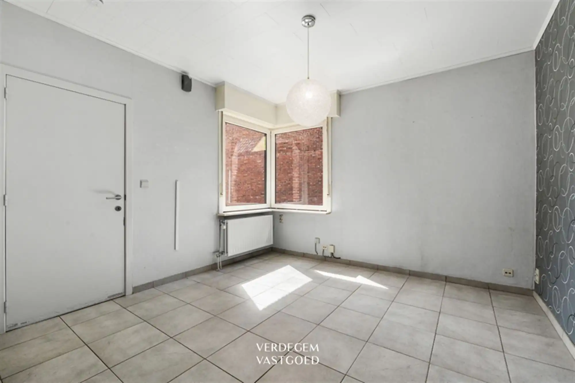 Opbrengsteigendom met 2 appartementen en 4 garages in het centrum van Sleidinge  foto 17