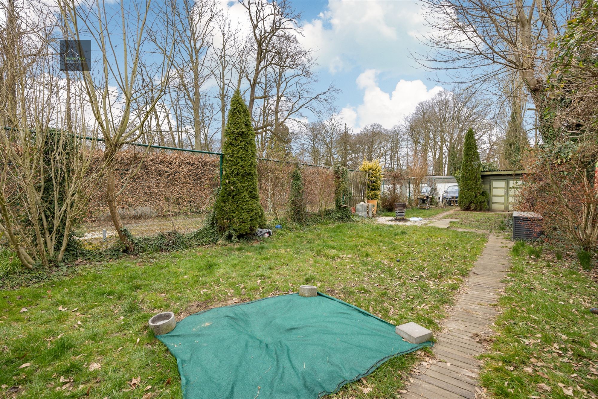 Ruim gelijkvloers appartement met tuin, parking en garagebox foto 16