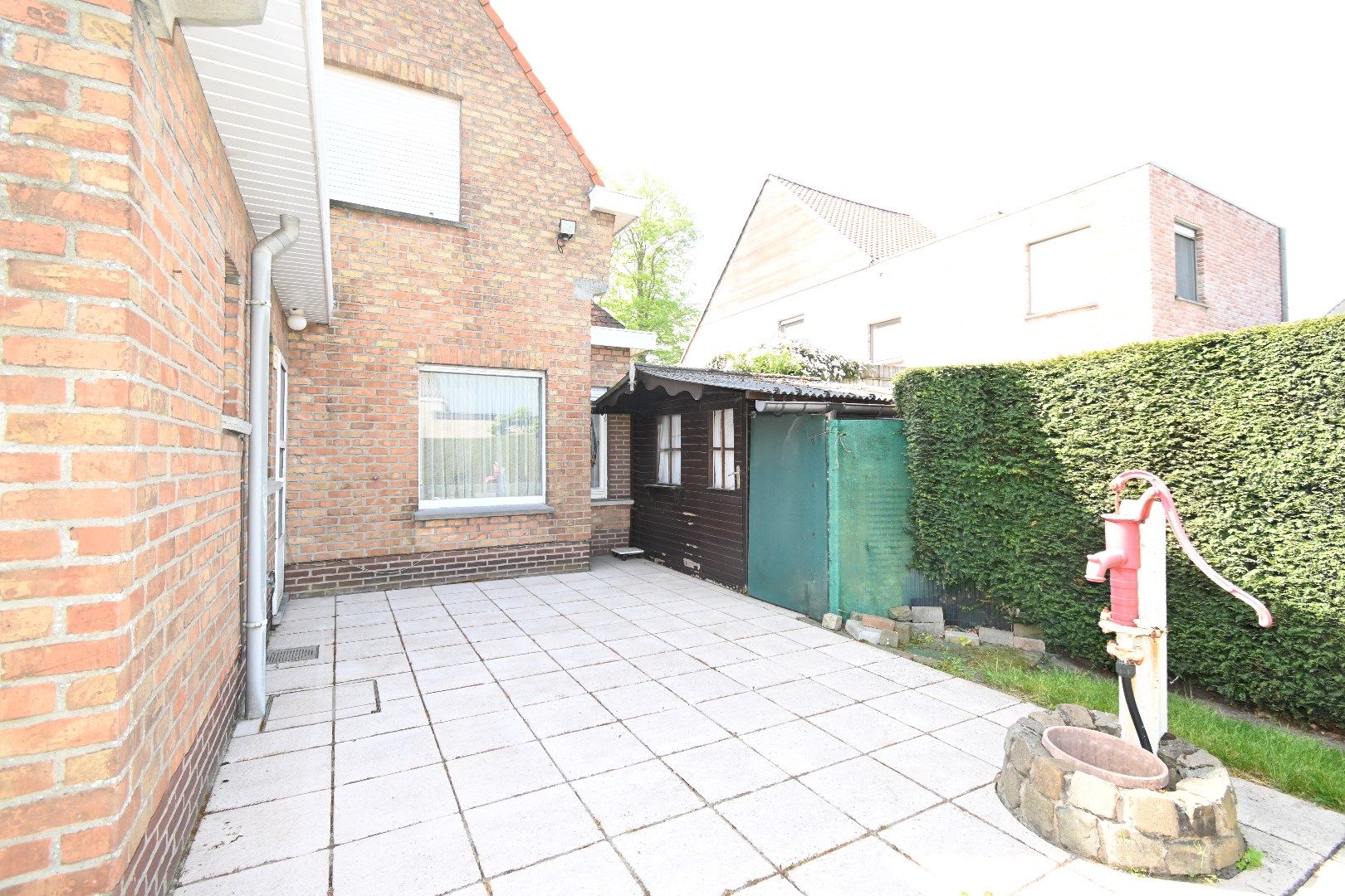 Alleenstaande woning met garage en tuin  foto 25