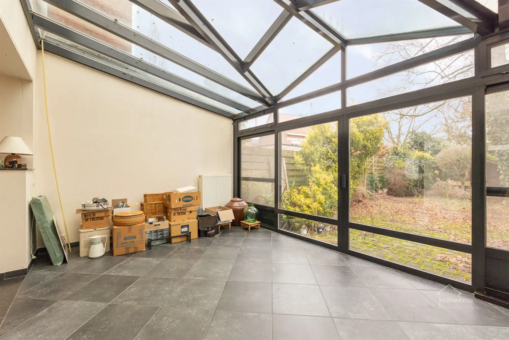 Ruime rijwoning op toplocatie met zongerichte tuin foto 7