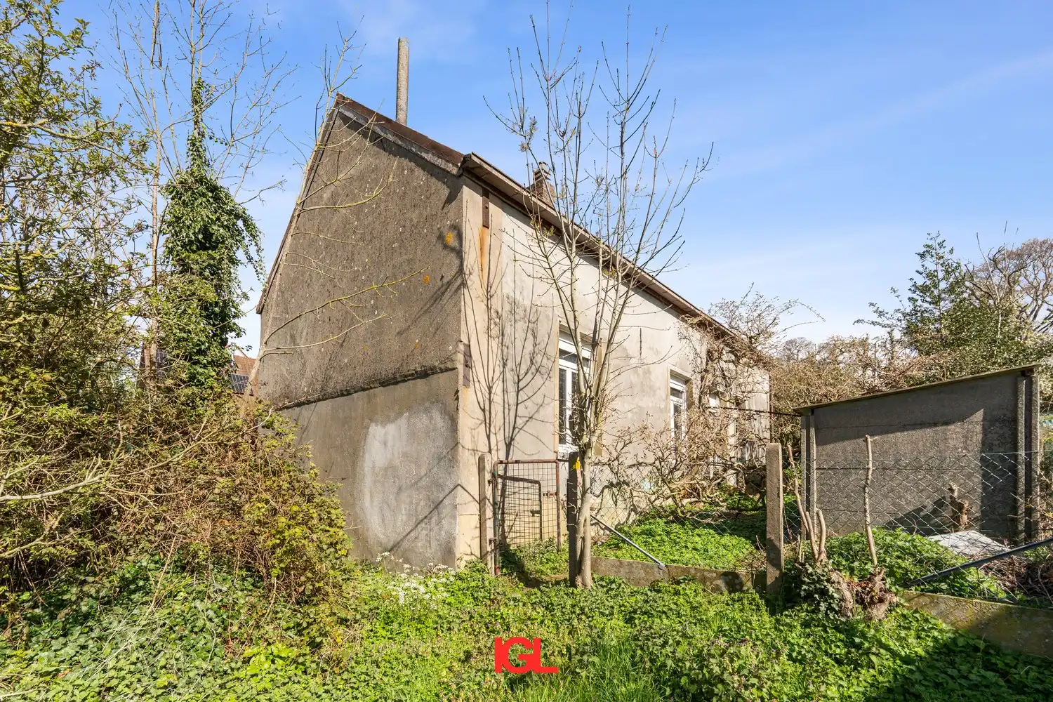 Te renoveren woning met grote tuin foto 4