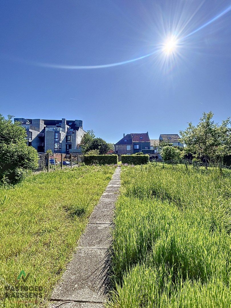 HOB met schitterende tuin in hartje Mariakerke foto 6