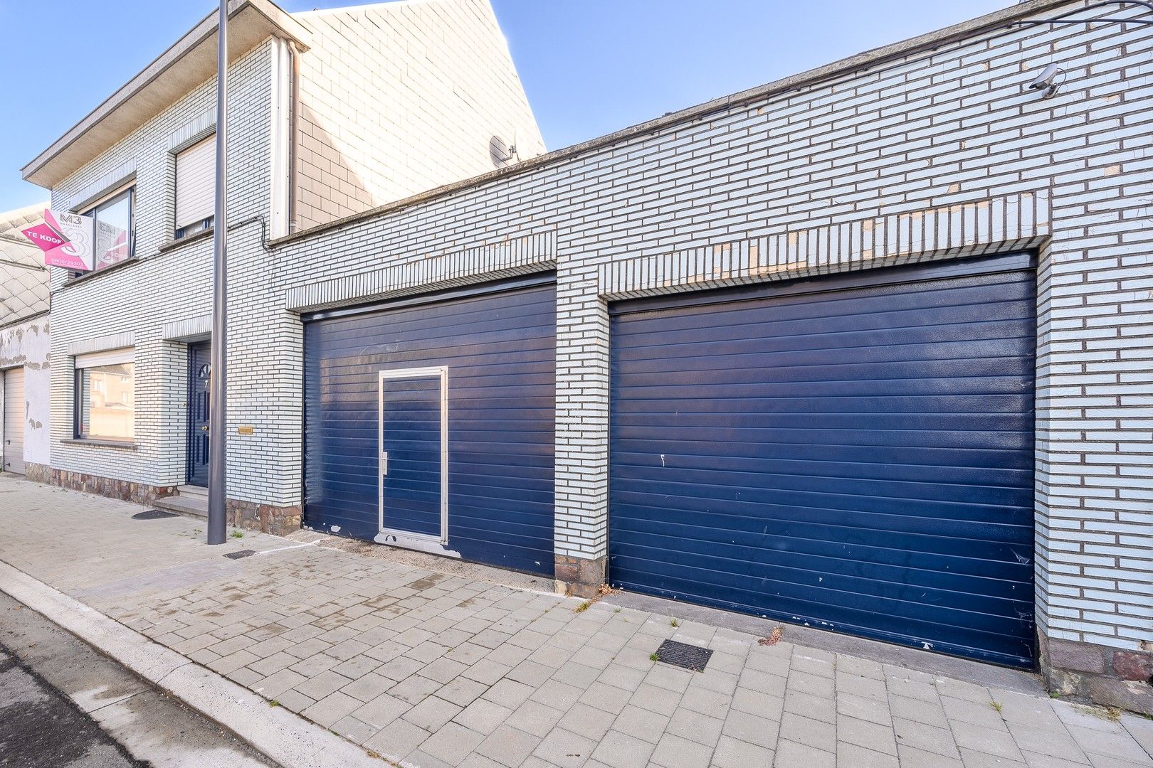 Solide woning met magazijn en garage foto 1