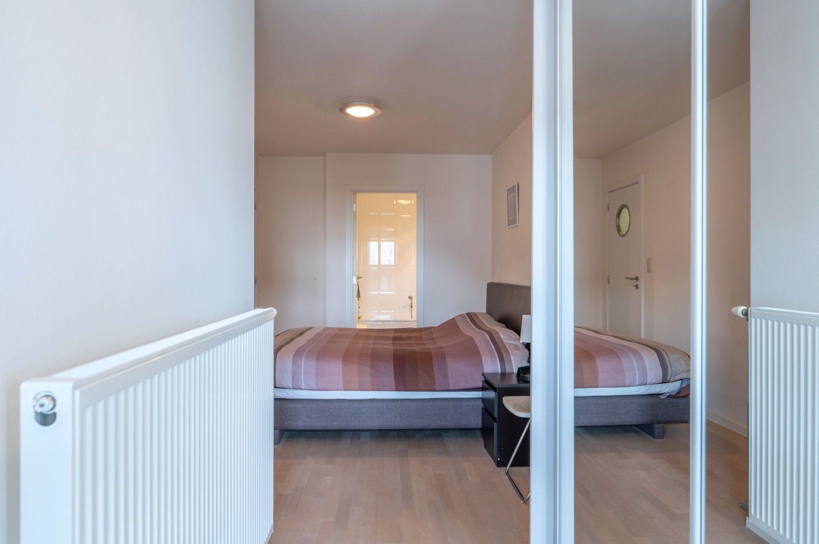 Zonnig doorloopappartement met twee slaapkamers! foto 6