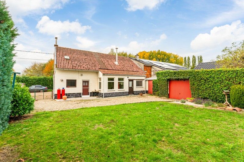 Charmante, te renoveren woning met tuin op 5are foto 3