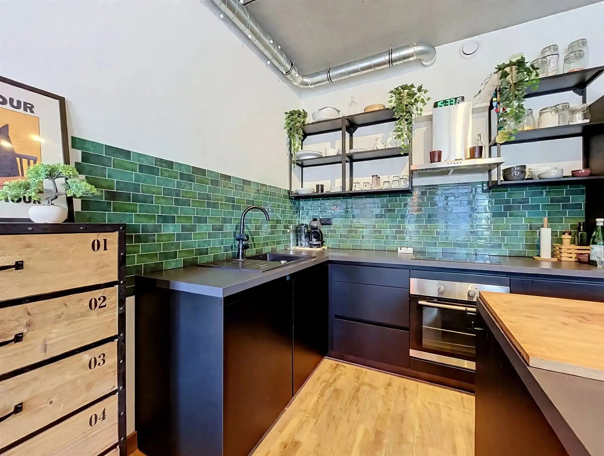 Modern gelijkvloers appartement met tuin van 200m²! foto 5