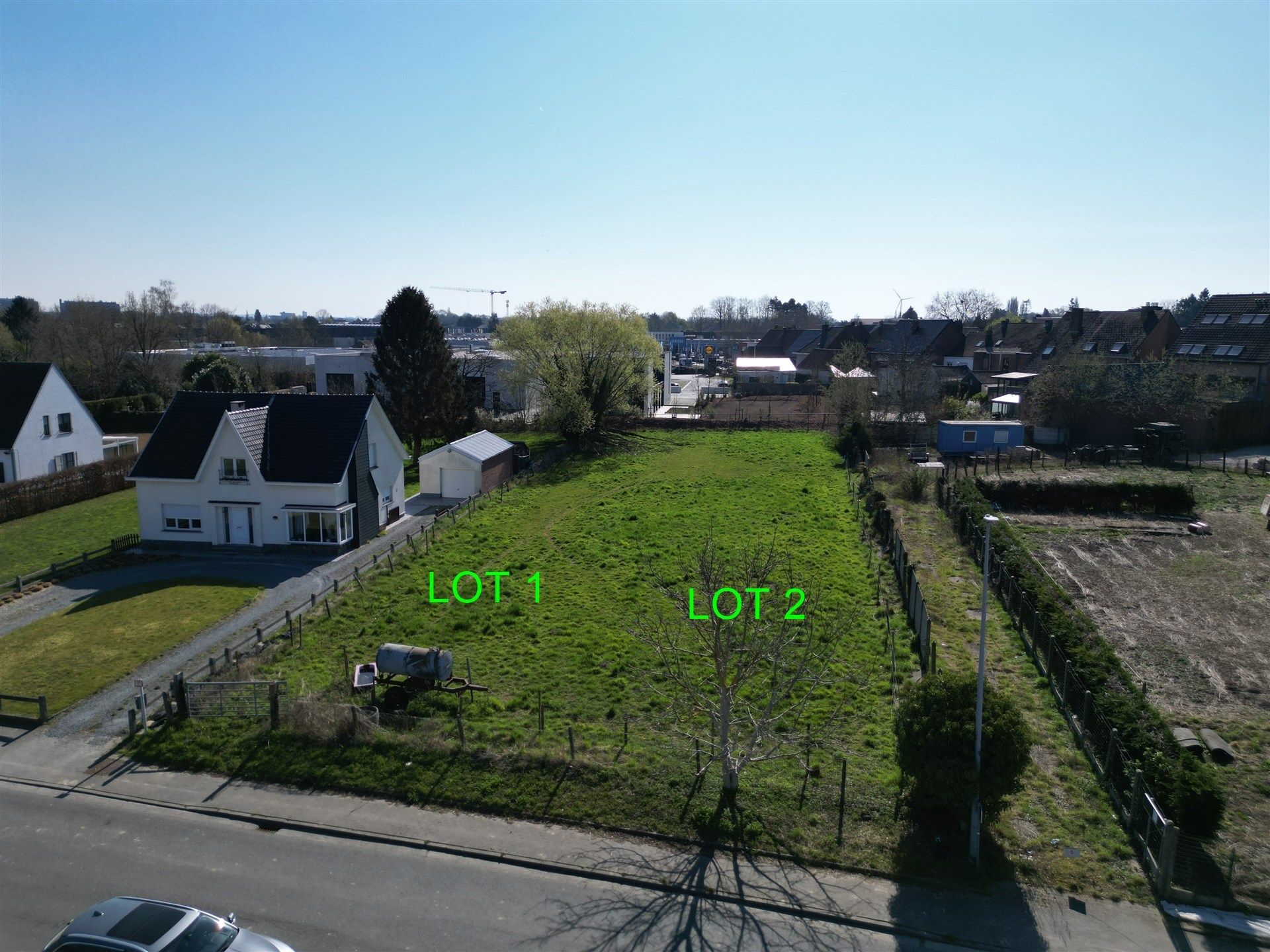 Bouwgrond voor halfopen bebouwing (lot 2) - 971 m² foto {{pictureIndex}}