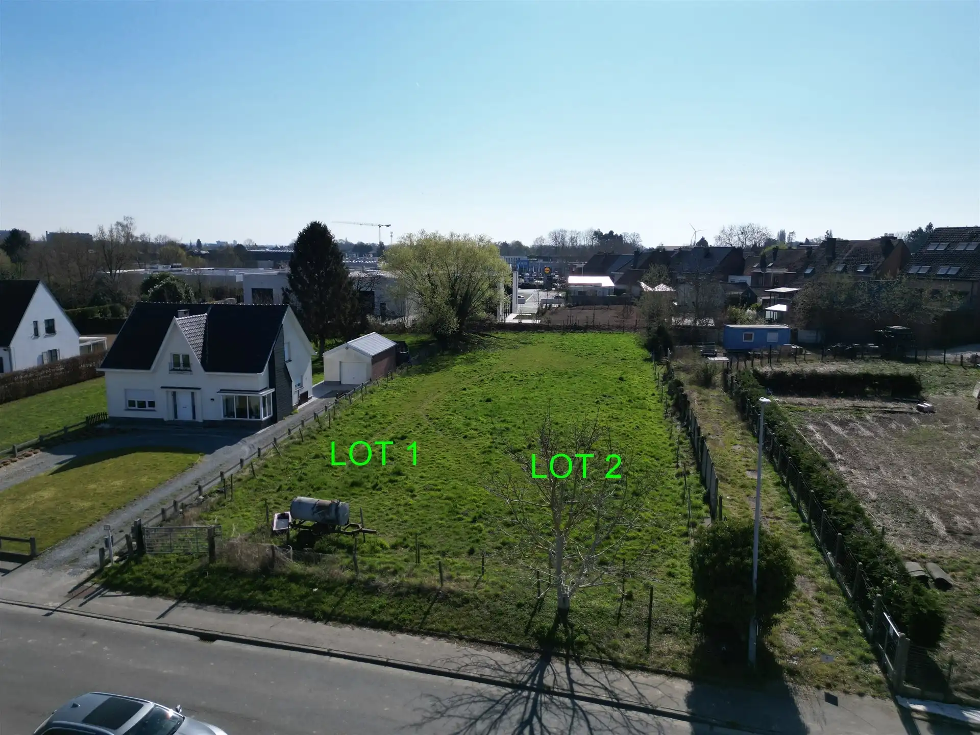 Bouwgrond voor halfopen bebouwing (lot 2) - 971 m² foto {{pictureIndex}}