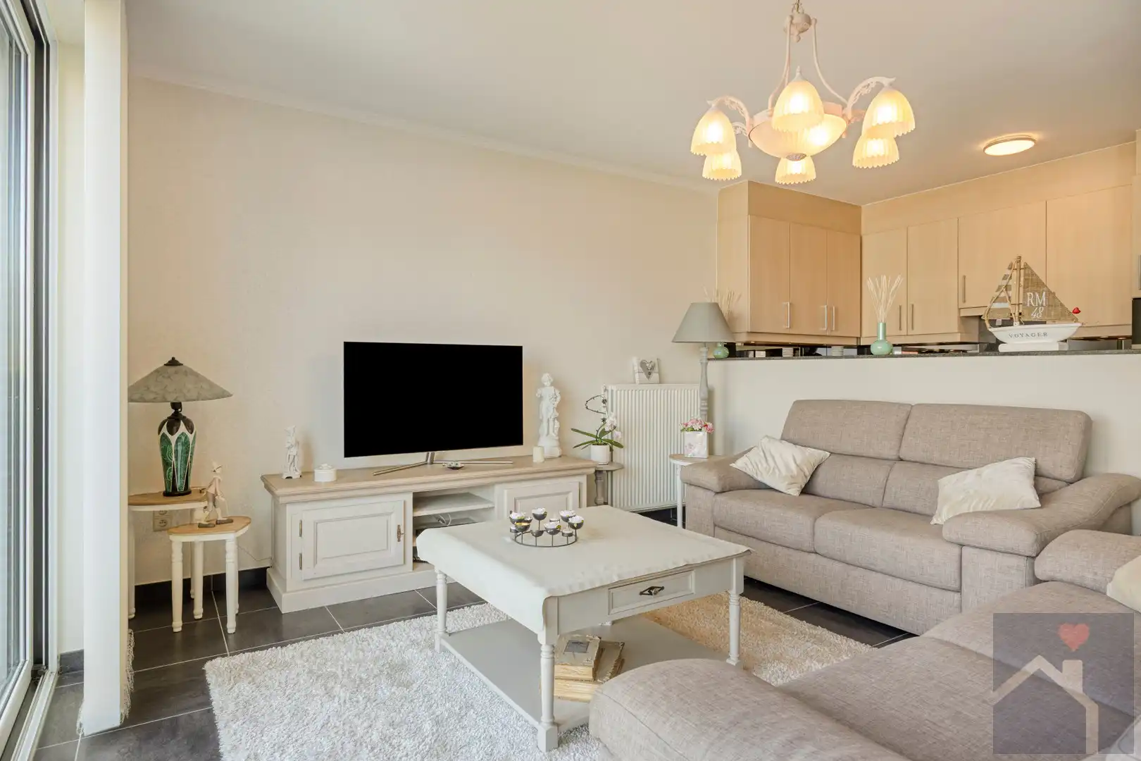 Instapklaar 2-slaapkamerappartement met terras, parking & berging in centrum Overpelt foto 7