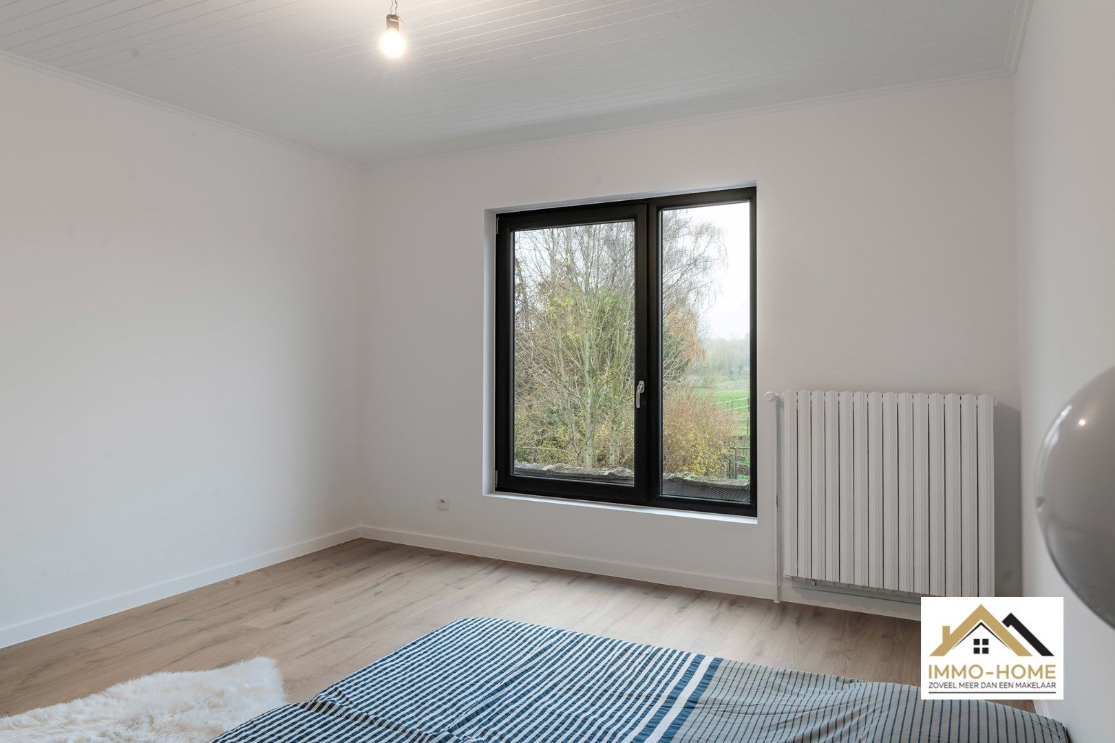 Zeer ruime woning met prachtig open zicht op agrarisch gebied foto 13