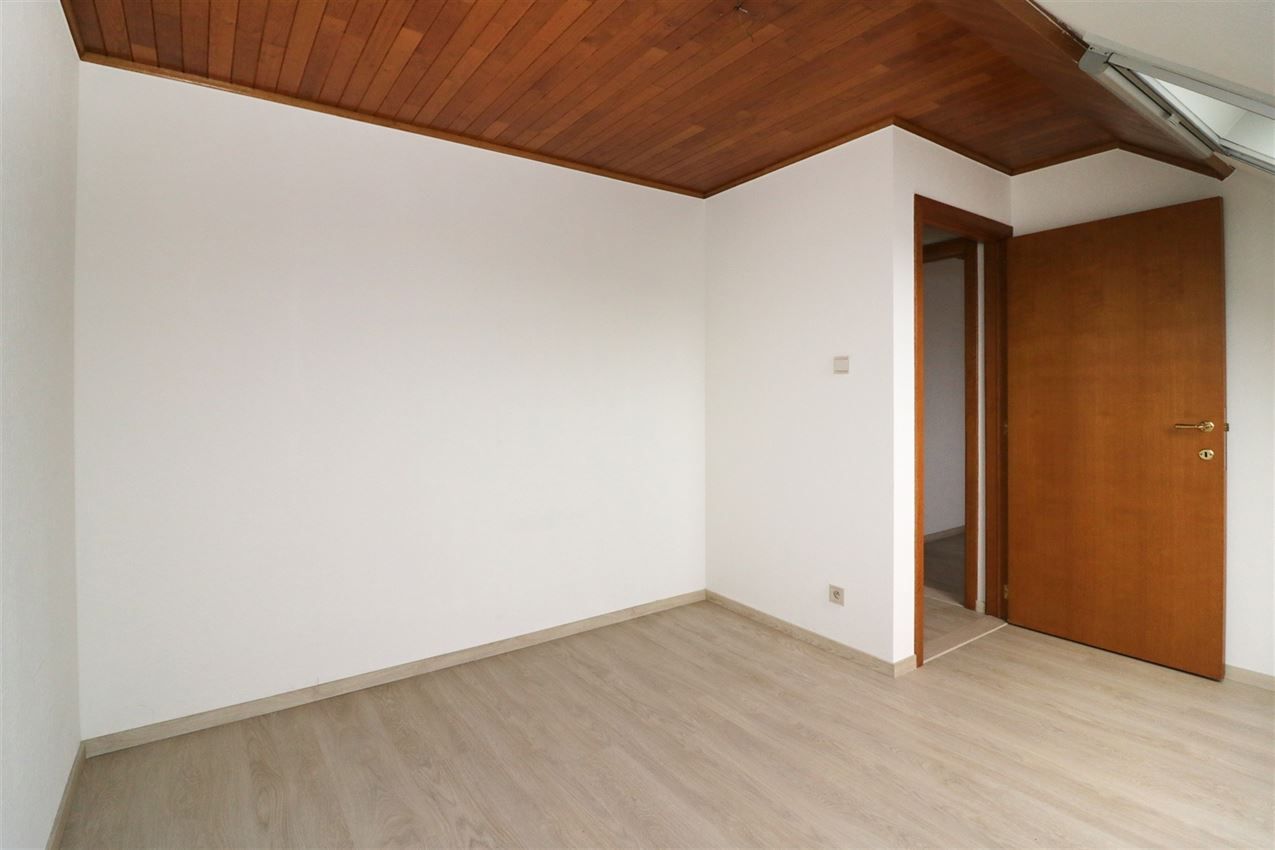 Centraal gelegen appartement met 3 slpk., garage en terras foto 21