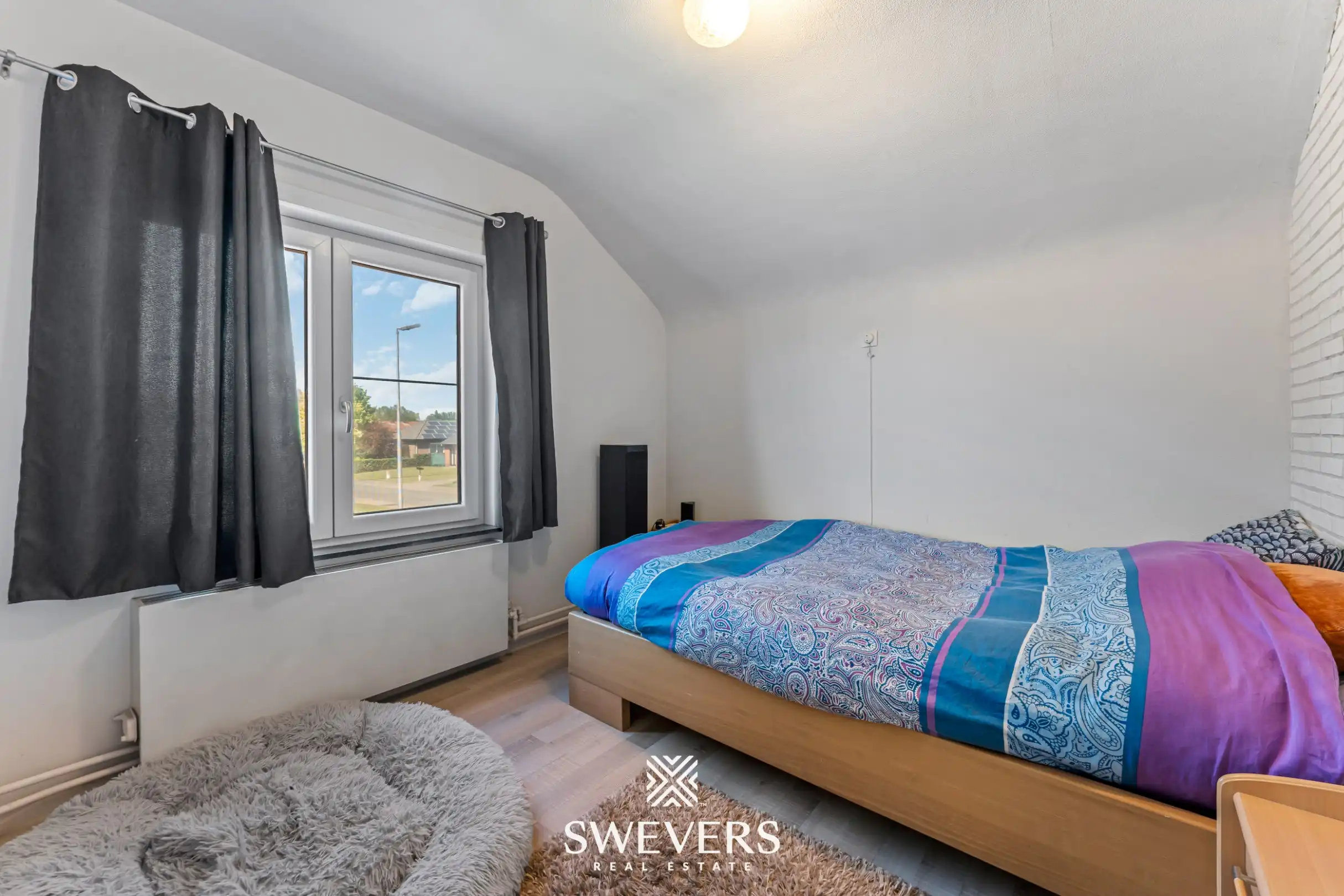 Instapklare gezinswoning met 3 slaapkamers en zonnige tuin op rustige, centrale ligging te Houthalen-Helchteren foto 11