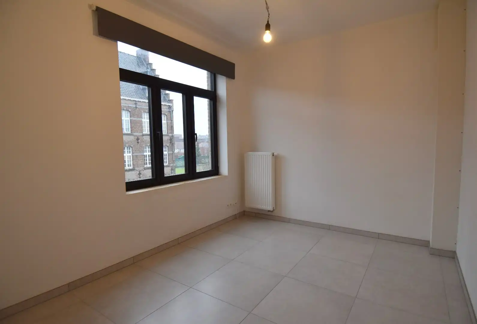 Rijwoning met 3 slaapkamers en tuin in Kortrijk foto 13