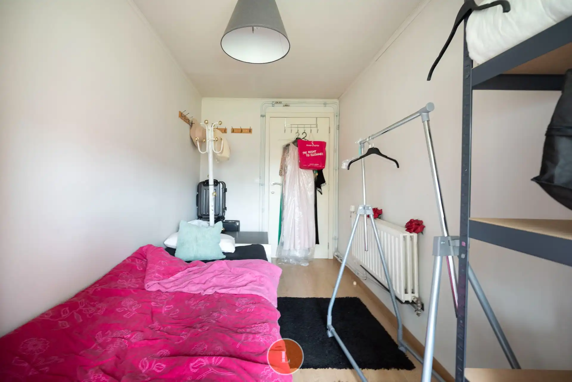 Instapklare woning met 2 slaapkamers, gezellige tuin en garage. foto 11