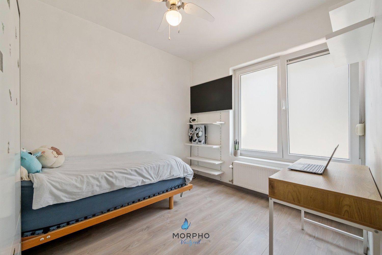 Instapklaar gelijkvloers appartement met 2 slpks, zonneterras en autostaanplaats. foto 9