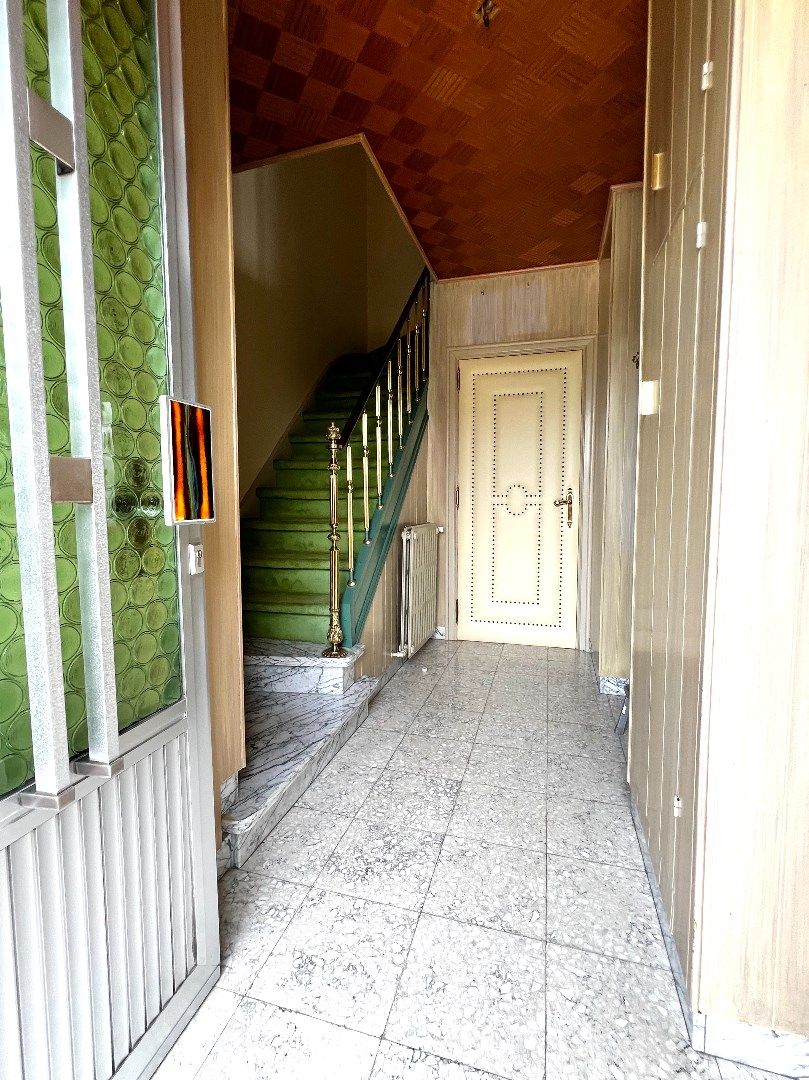 Halfopen bebouwing te koop in het centrum van Stasegem foto 3