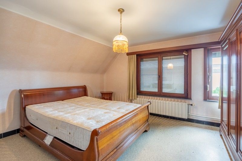 Woning, open bebouwing met naastliggende, grote loods op 18are foto 28
