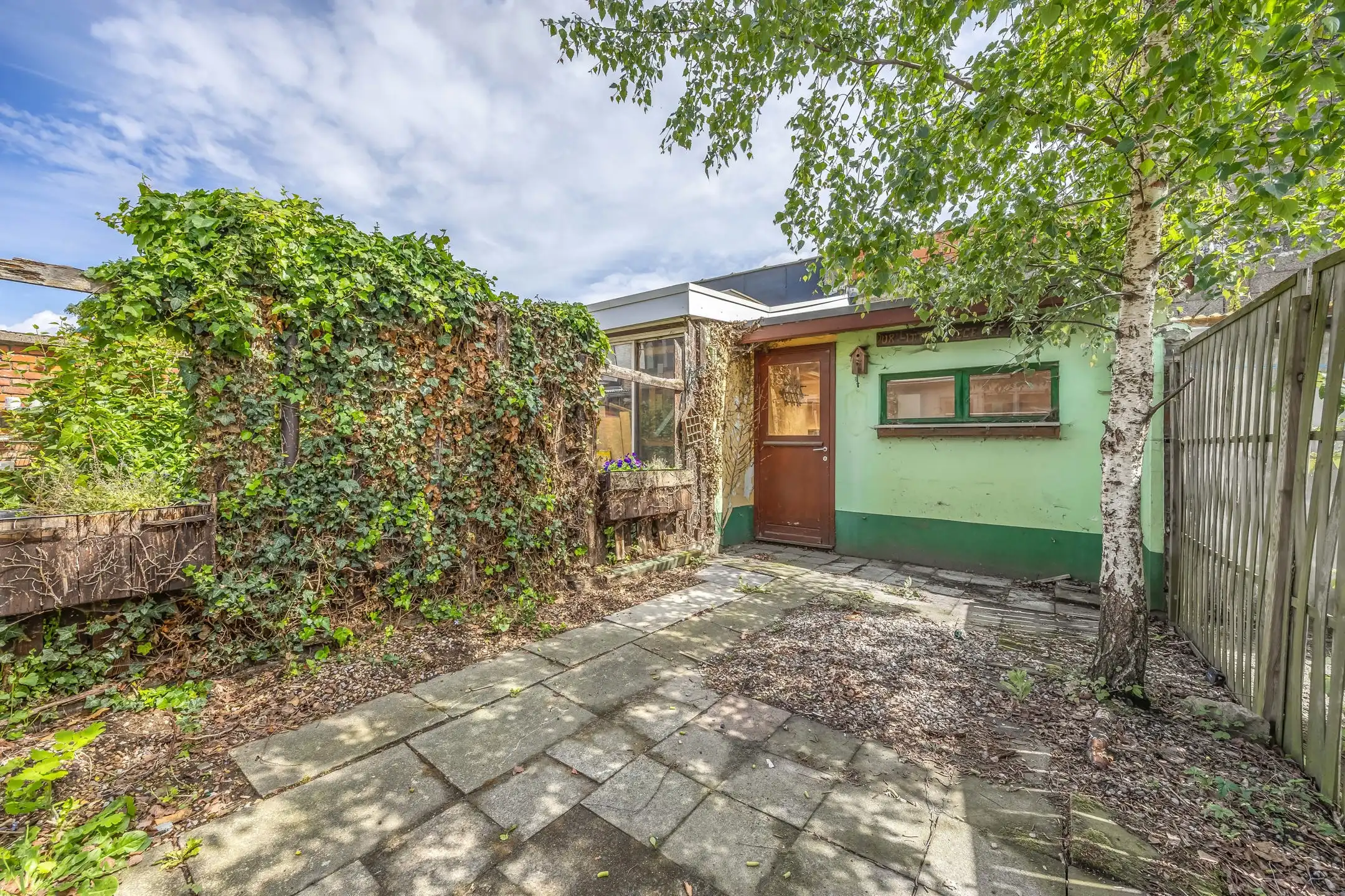 te renoveren woning met 3 ruime slaapkamers , garage en tuin foto 9