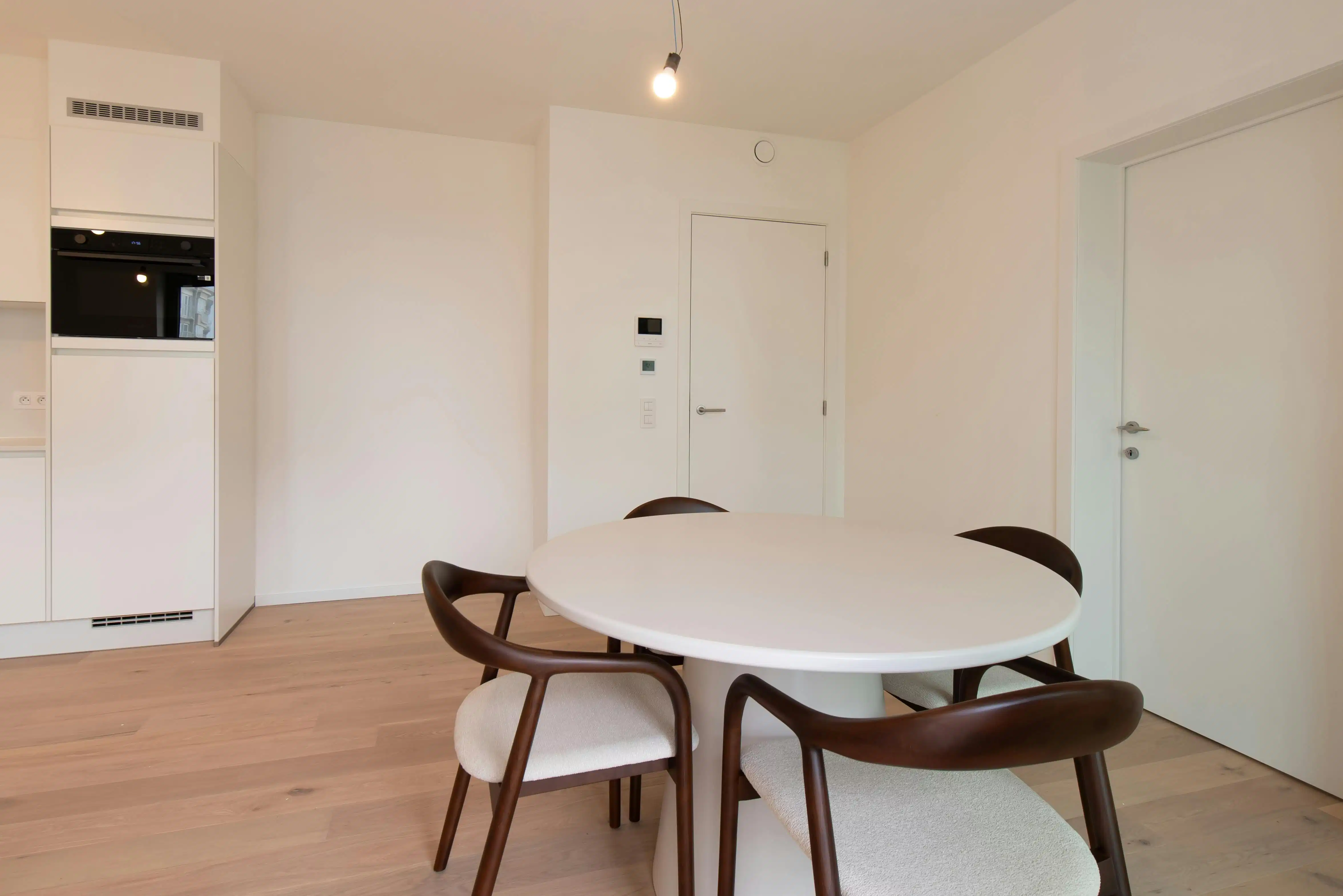 Lichtrijk nieuwbouw 1-slaapkamer appartement te Oostende foto 10