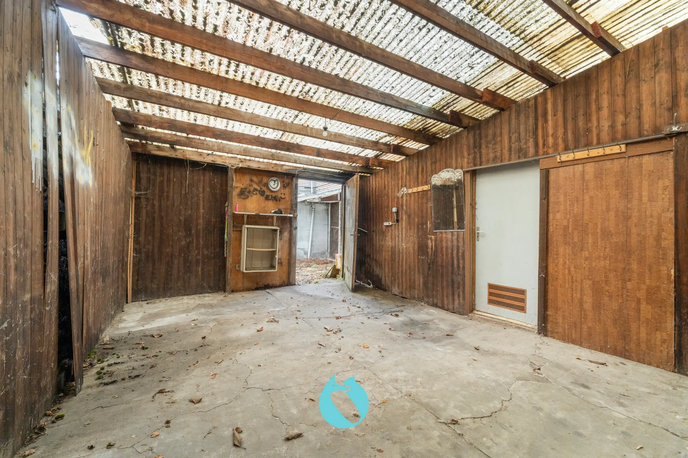 Te renoveren pand in tweede bouwlijn met oprit en tuin foto 12