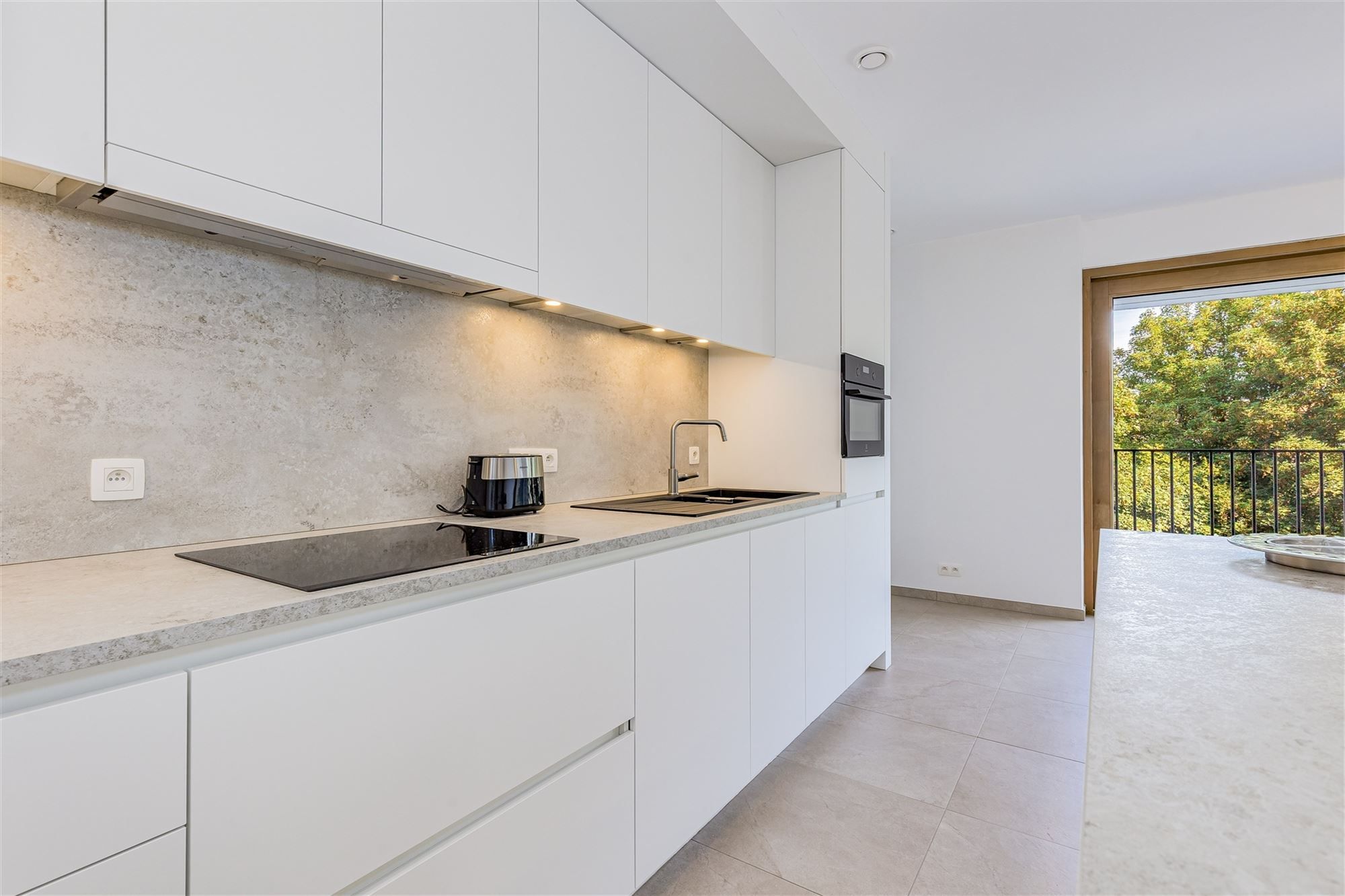 Energiezuinig appartement met 2 slaapkamers, terras en parkeerplaats foto {{pictureIndex}}