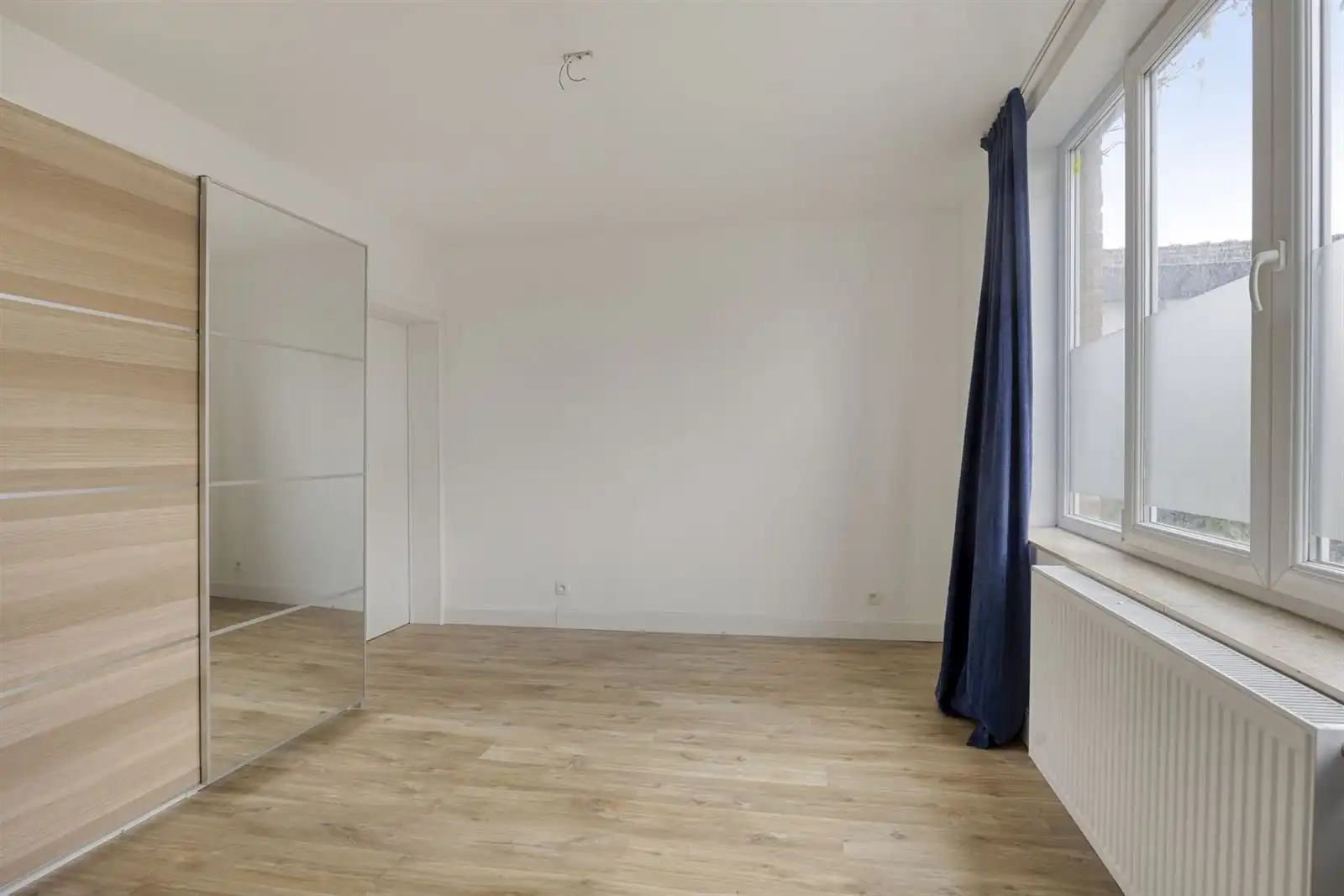 Instapklaar 1-kamer appartement met parking en tuin  foto 10