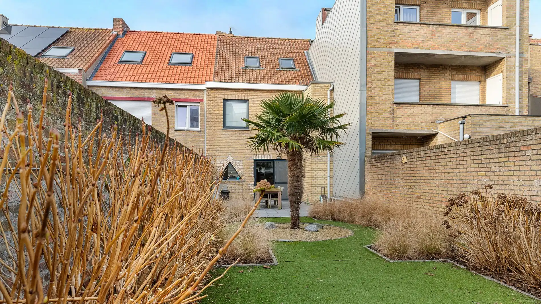 Instapklare woning met zonnige tuin in het centrum van Heist foto 26