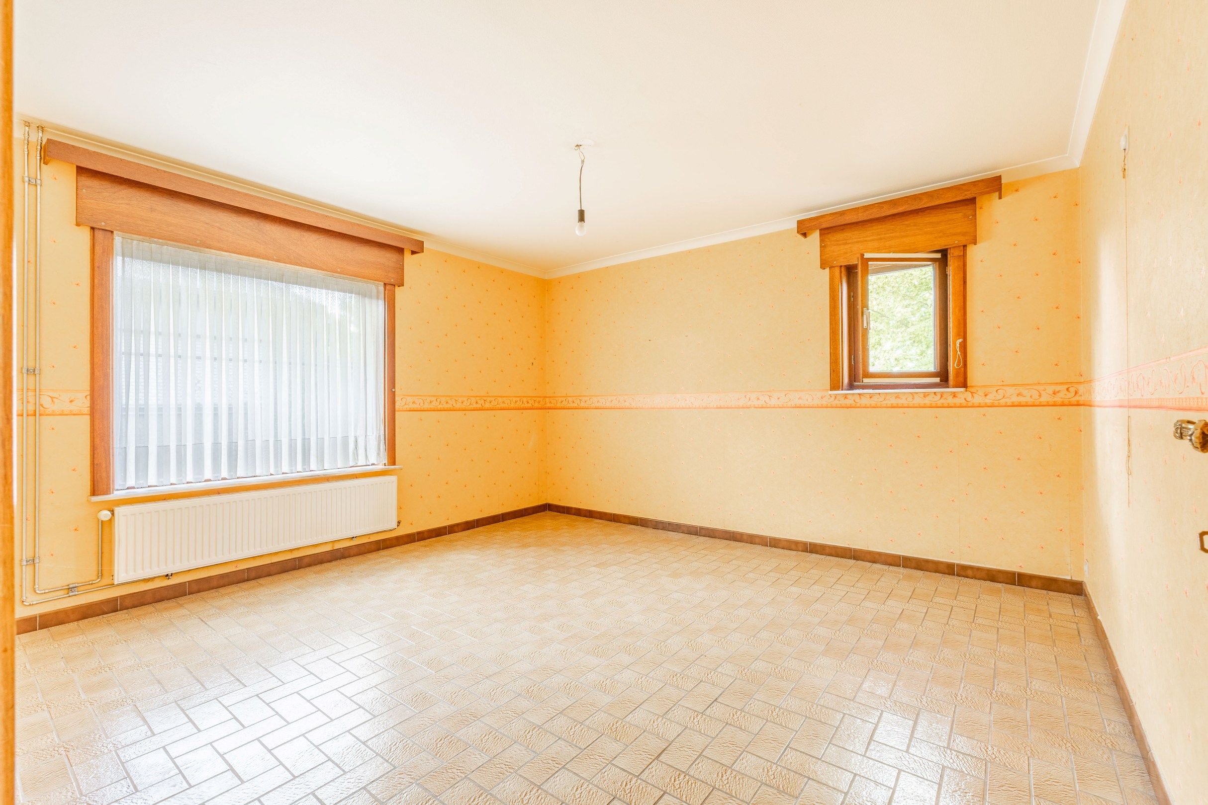 TRAPLOZE WONING MET ZONNIGE TUIN foto 12