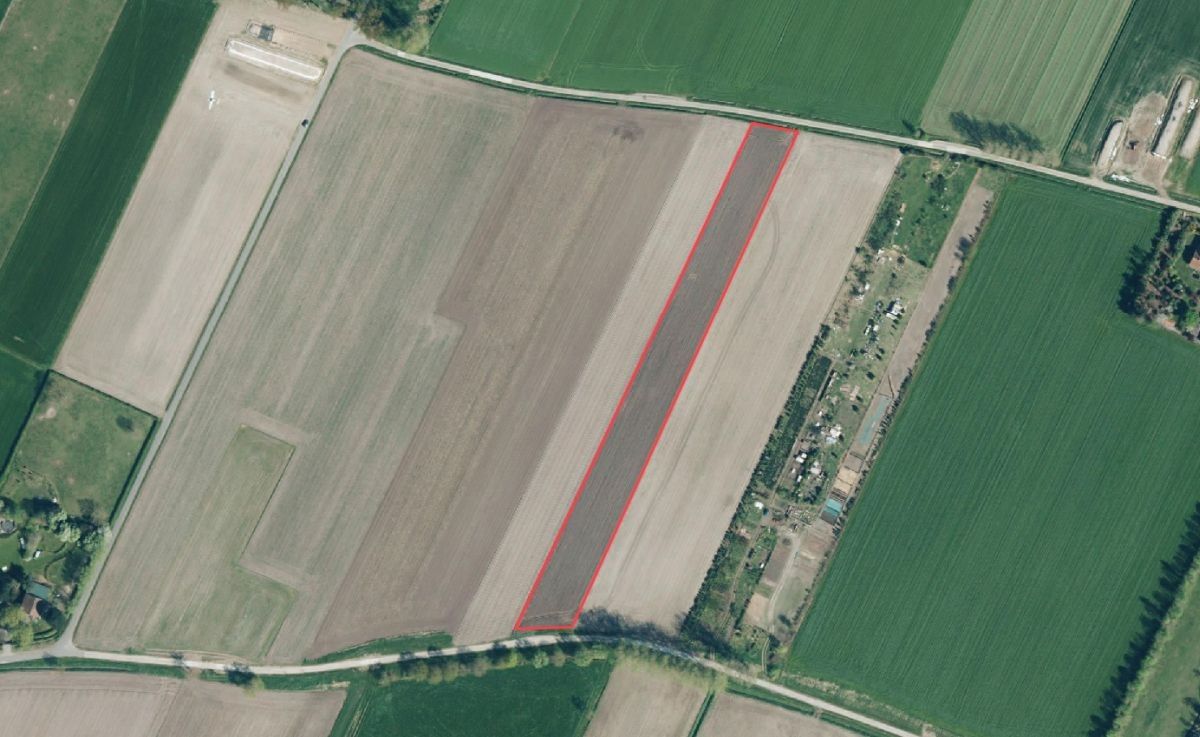 Perceel akkerland vrij van pacht te koop te Sint-Laureins foto {{pictureIndex}}